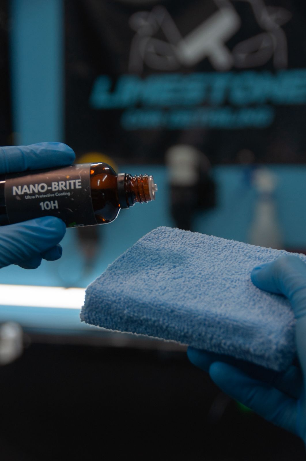 Ceramic coating product being applied with microfiber cloth